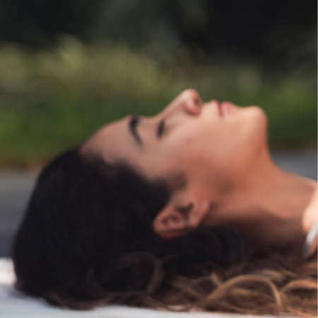 Woman lying on Blue Yoga Mat von Los Muertos Crew Canva